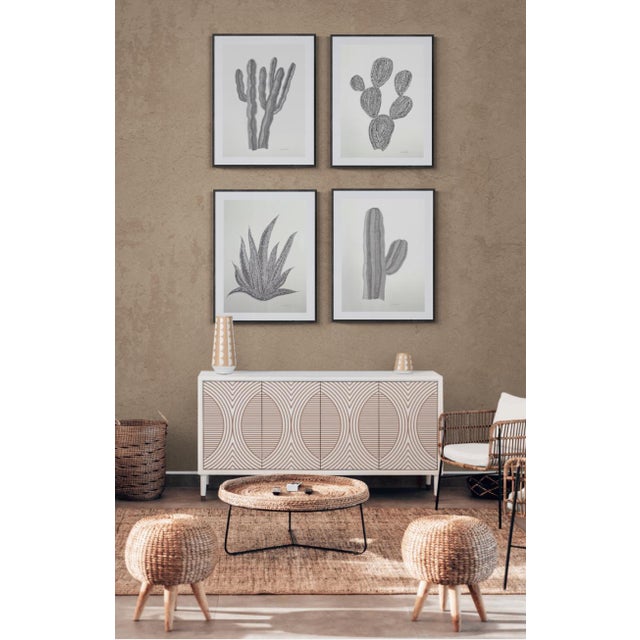 Bring a little of the desert home with this southwest inspired work by Sarah Vaaler. This minimalist piece features a...