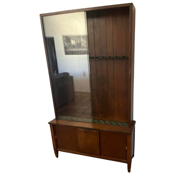 Beautiful mid-century, modern walnut and glass rifle display case. Has some scuffs, but it has not been refinished from...