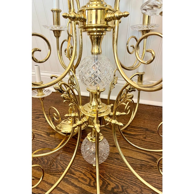 Beautiful vintage brass and crystal twelve light chandelier by Quoizel, known for its "Vintage Beach Bungalow" or "Tole...