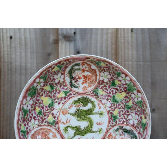A rare and unusual Chinese porcelain plate dating to the second half of the 19th century, during the Qing dynasty,...