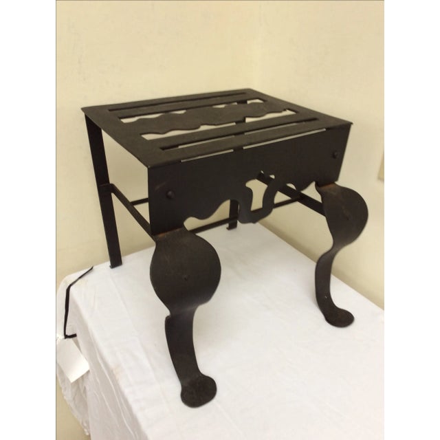 Antique footman or kettle stand in blackened steel. Great as a small step or as an little side table or an accent piece...