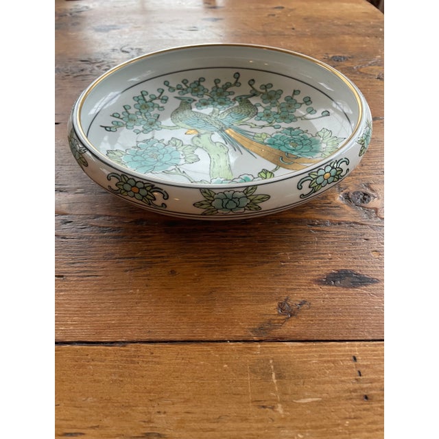 Gold-Imari hand-painted bowl with botanical and peacock pattern. Colors are magnificent in gold, blues, and greens....