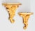 A lovely pair of vintage Italian gilded wood and gesso wall brackets shelves, circa 1950. These stunning brackets are...