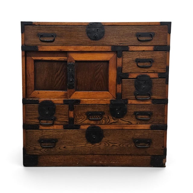 A late nineteenth-century Japanese Chōba Tansu merchant’s chest from the Meiji period, constructed in solid Sugi, or...