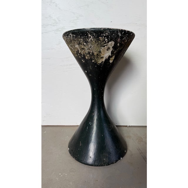 Bring iconic mid-century design into your space with this striking hourglass planter. This sculptural piece is a timeless...