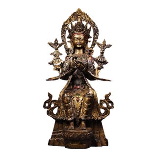 Vintage Gilt Bronze Seated Buddha, High Relief Carving With Flanking Vines For Sale
