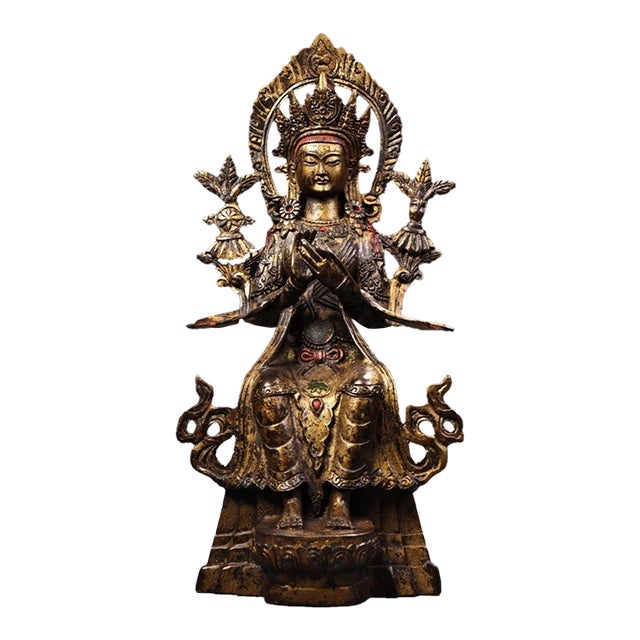 Vintage Gilt Bronze Seated Buddha, High Relief Carving With Flanking Vines For Sale