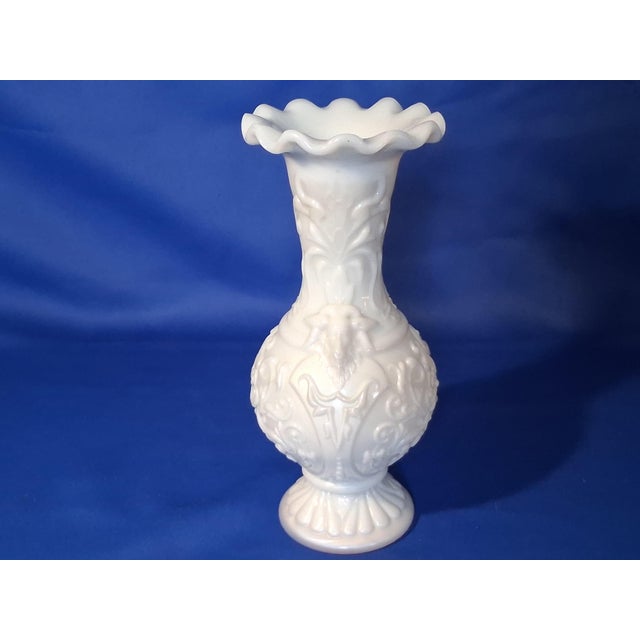 This hand blown Victorian French opaline glass vase was made by the Portieux Vallerystahl Co. from Vosges, France and they...