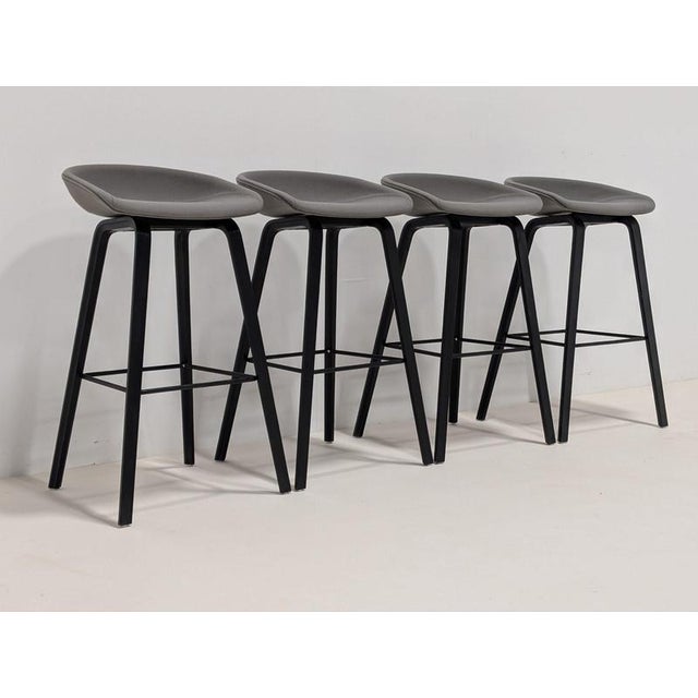 Featuring an elegant curved backrest and long smooth wooden legs, the hay about a stool aas 32 offers a strong visual...