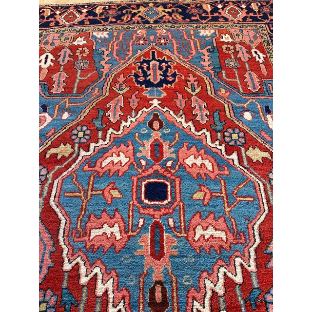 Late 19th and early 20th-century Serapi rugs represent a pinnacle of artistic achievement in Persian carpet weaving....