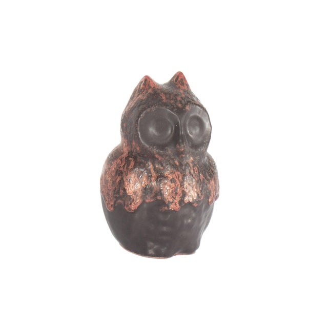 A West German fat lava ceramic owl produced by Otto Keramik. This mid-century owl figurine features a round body, with a...