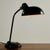 An iconic Bauhaus piece. The table lamp was designed by Christian Dell for Helo Leuchten in the 1950s. The angle of the...