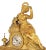 Charles X Gilt Bronze Figural Mantel Clock, circa 1830, the circular silvered dial, with strike on bell movement,...