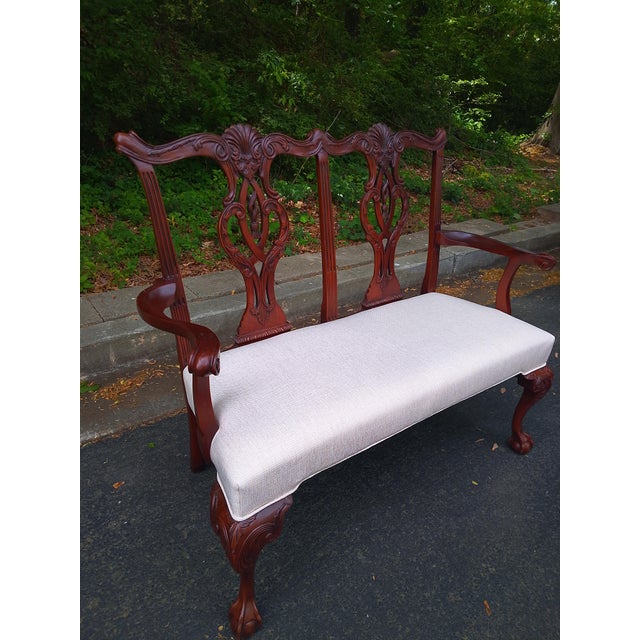 Expertly crafted Hickory Chair “Mount Vernon” attributed settee featuring classic Chippendale-inspired design and...