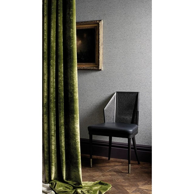 A lustrous semi-plain velvet cotton-blend fabric woven with two viscose yarns in the pile to create an uneven yet elegant...