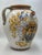 Antique 19th century Italian Majolica olive oil storage jar with a hand-painted heraldic shield featuring two winged lions...