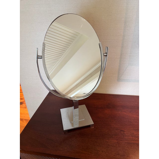 Large, mid-century tabletop vintage mirror. Two sided, with standard mirror on both sides. Can be angled in both...