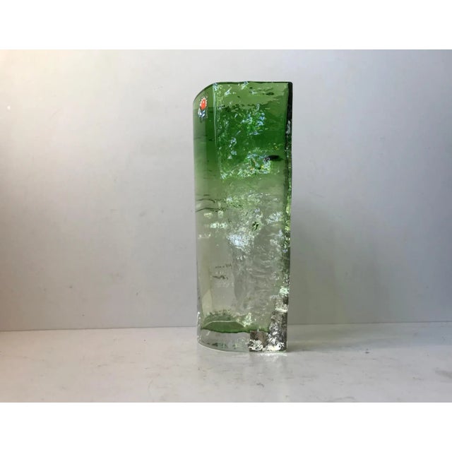 - A thick and heavy textured ice glass vase - Made in green hues - It was designed by Kaj Blomqvist during the late 1960s...
