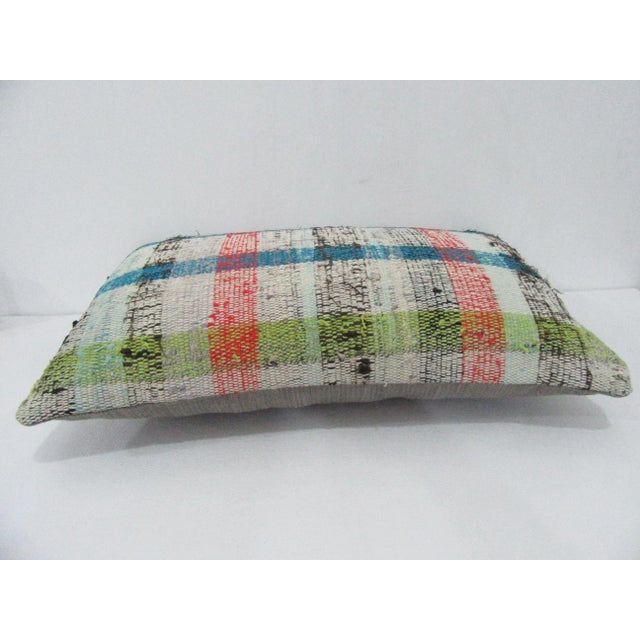Handmade decorative pillow cover made from a vintage Turkish kilim rug. Backed with good quality cotton fabric. Pillow...