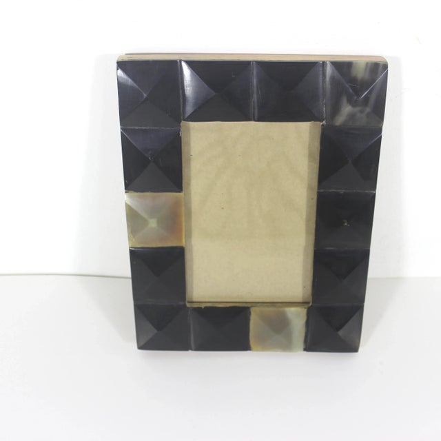Image size (in.): 4 x 6 Vintage hand carved natural horn rectangular frame. Easel back for a table top display. This can...