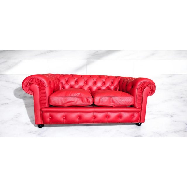 The Chester sofa features a spring system made with hand-placed conical steel springs, secured to jute straps on a...