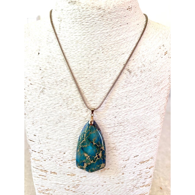 Lovely Vintage sterling silver necklace with turquoise pendant