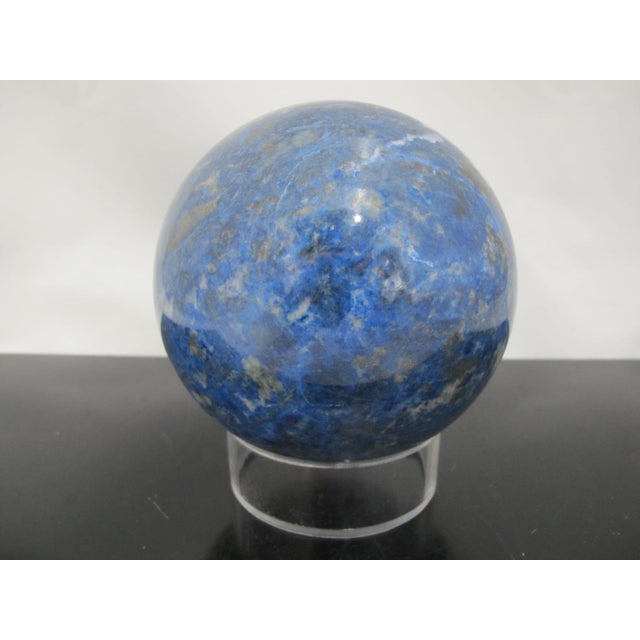 Large Lapis Lazuli quartz crystal sphere with clear Lucite stand. A decorative gemstone ball, polished from natural stone...