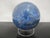 Large Lapis Lazuli quartz crystal sphere with clear Lucite stand. A decorative gemstone ball, polished from natural stone...