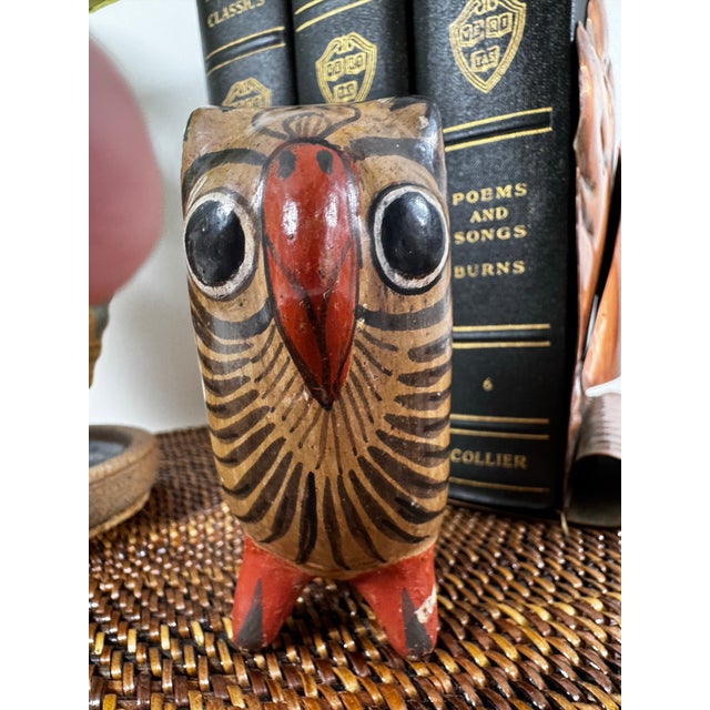 This vintage clay owl figurine originates from Tonalá, Jalisco, Mexico, a region renowned for its long-standing tradition...