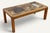 A beautiful French coffee table designed by Pierre Chapo in the 1960s. Made of elm, it features a striking ceramic tile...