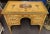 Exquisite early 19th century paint decorated kneehole desk that is d3corated on three sides and the top. It does have some...