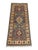 Three bold geometric medallions run down the charcoal gray field of this Kazak-style runner. Deep red, navy, green, and...