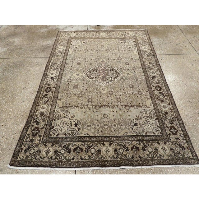 A vintage Persian Malayer accent rug handmade during the mid-20th century. Measures: 4' 6" x 6' 8"