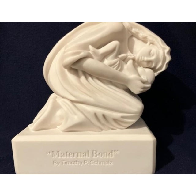 profound and substantial "Desktop Edition" of the celebrated "Maternal Bond" sculpture by world-renowned artist Timothy P....