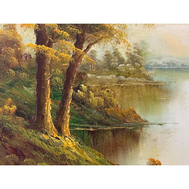 Golden haze settles on calm waters, holding a cottage in quiet reverie 1975 Circa For Sale - Image 6 of 18
