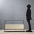 Chest of drawers with a curved glass frame and four white lacquered wood drawers. It features the manufacturer's...