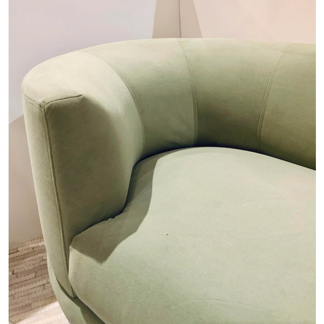 Stylish Modern Willow Green Velvet Curved End Sofa, black steel base, showroom floor sample