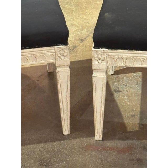 This product is a pair of Swedish Gustavian painted benches. They have classic and elegant design typical of the Gustavian...