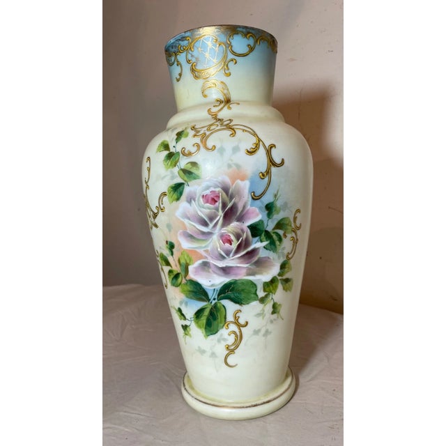 Up for sale is a nice quality early 20th century antique hand enameled bristol glass vase. It's mold blown with an...