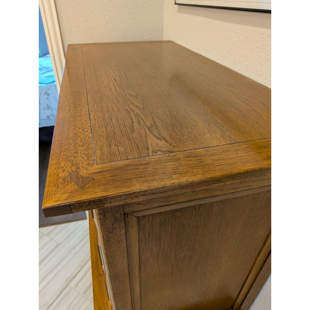 Elevate your bedroom or living space with this exceptional vintage chest-on-chest tallboy dresser by renowned American...