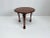 Very elegant vintage tripod side table or plant stand with carved decorations.