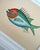 A bright and cheerful fish painting, hand-painted by master artists using acrylic paints and natural pigments. He is full...