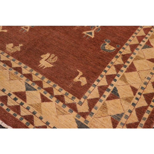 With strict standards of craftsmanship and quality of materials used this modern inspired hand knotted Gabbeh rug is a...