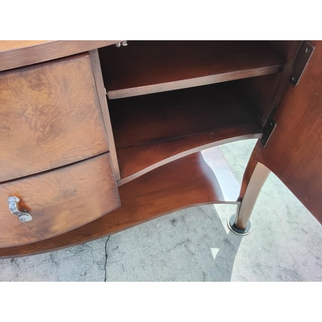 So much storage, open and closed storage. The glass top shows off your pretty china on the wooded shelf. There are 2 felt...