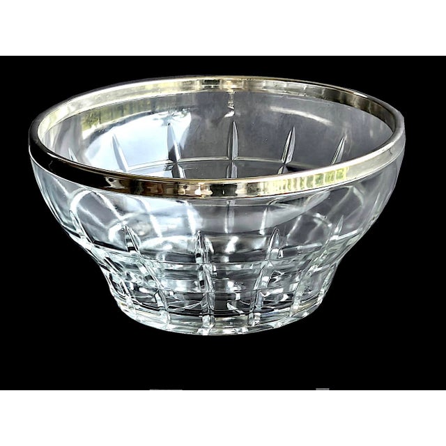 Offered is a heavy cut glass bowl with a silver plated top band rim made in Italy in the 1970s. While perfectly food safe...