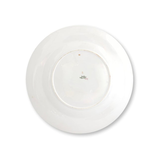 Elegant 24-piece Spode Claridge dinnerware service retailed by Tiffany & Co., dating from the mid 20th century. Crafted in...