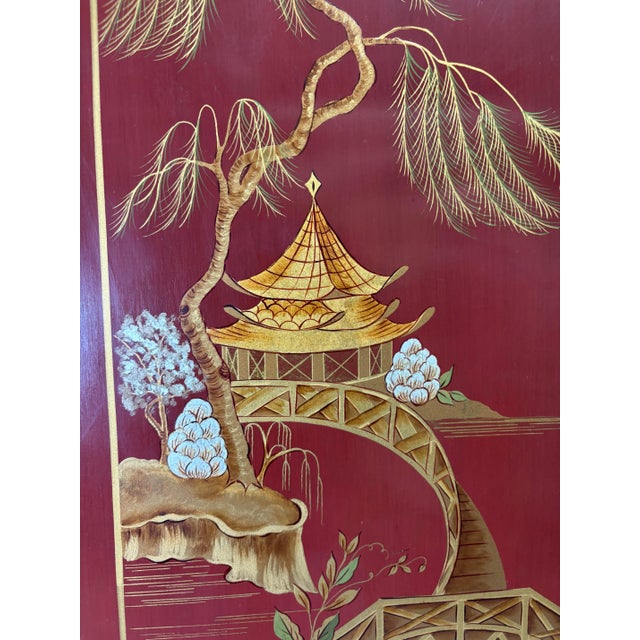 This is a mid-century vintage hand painted Chinese inspired two door cabinet. This beautifully painted cabinet has a...