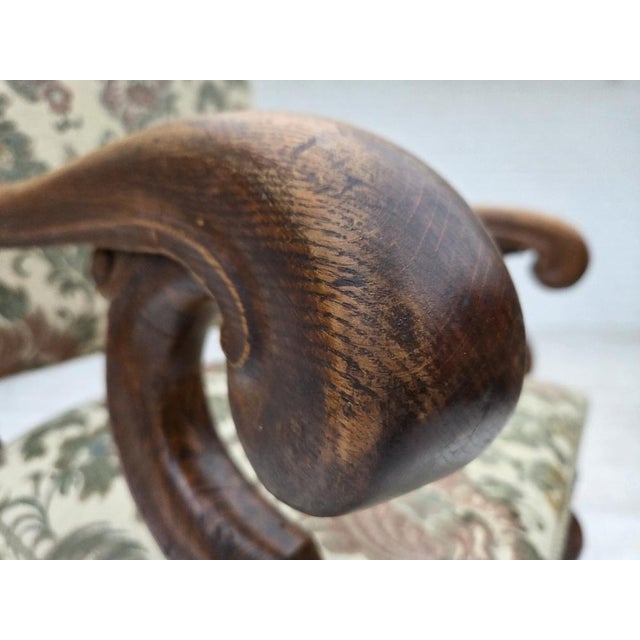 1950s, Scandinavian highback armchair. White/green furniture fabric, hand carved oak wood, springs in the seat. Original...