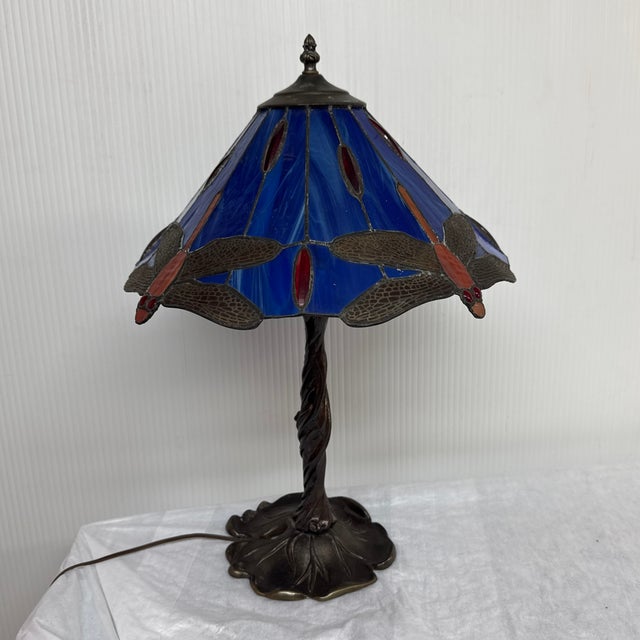 Design Plus Gallery presents a Stained Glass Shade Table Lamp. The style of lamp is reminiscent of Tiffany lighting that...