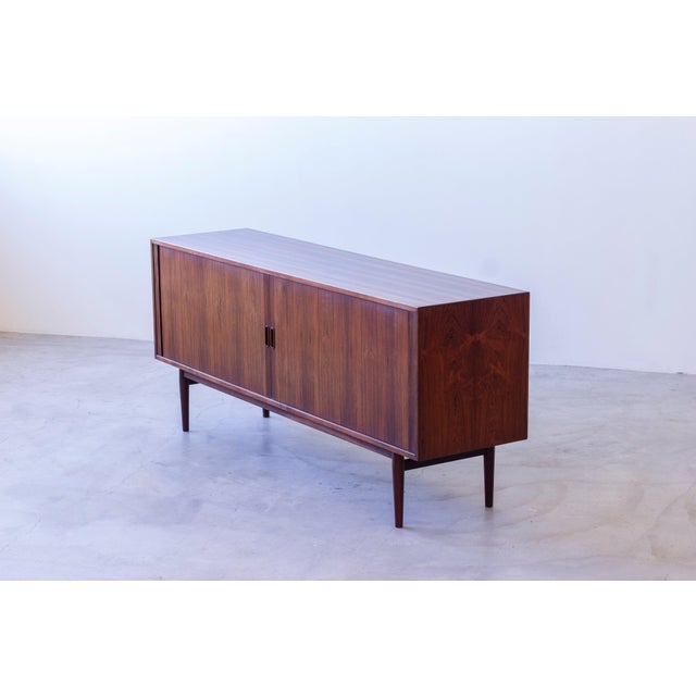 Sideboard designed by arne vodder. Produced in denmark by sibast furniture during the 1950s. Very nice quality throughout...